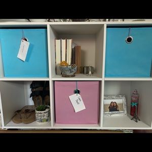 Pink and blue storage cubes.